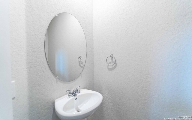 6546 Scooby Acres, San Antonio, TX 78253 - bathroom with a sink and a textured wall