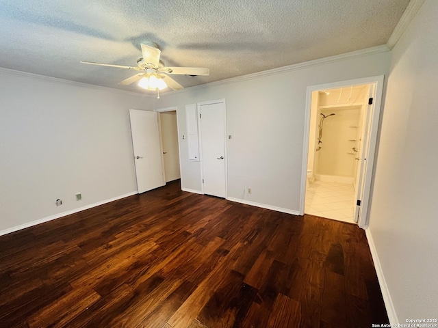 unfurnished bedroom with ensuite bathroom, ceiling fan, dark hardwood / wood-style floors, a textured ceiling, and ornamental molding