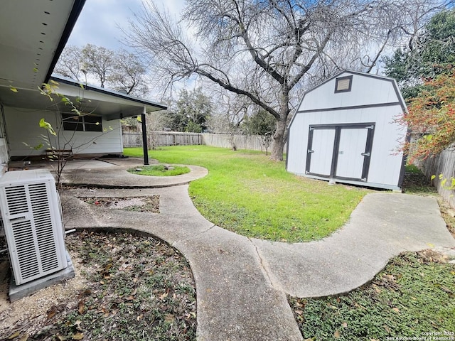 view of yard with a patio area, a shed, and ac unit