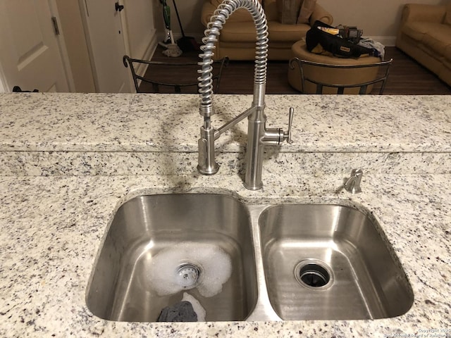 interior details with sink and light stone counters