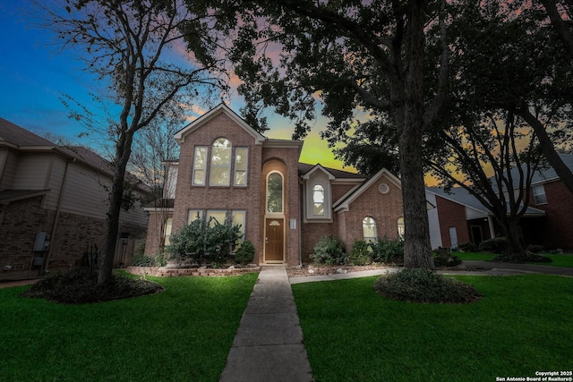 view of front property with a yard