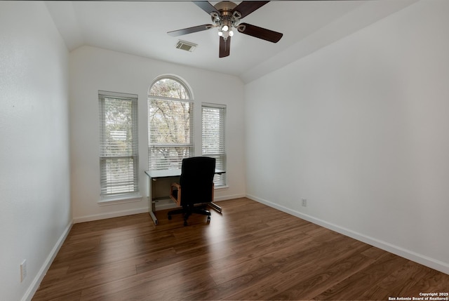 unfurnished office with ceiling fan, dark hardwood / wood-style flooring, and lofted ceiling