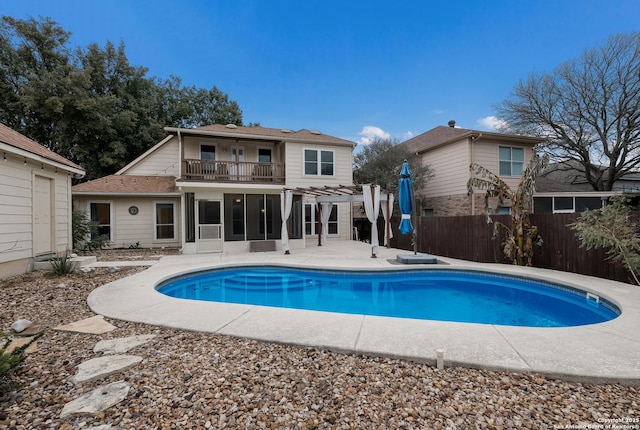 view of swimming pool featuring a pergola and a patio