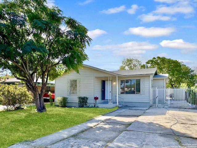 ranch-style house with a front yard