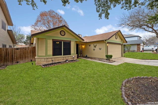 ranch-style house featuring a front lawn and a garage