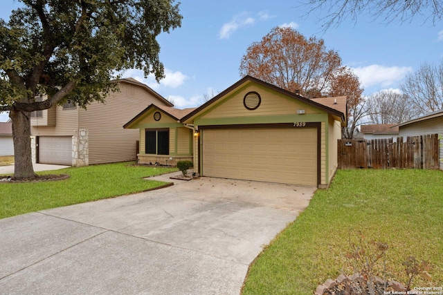 ranch-style home featuring a front lawn and a garage