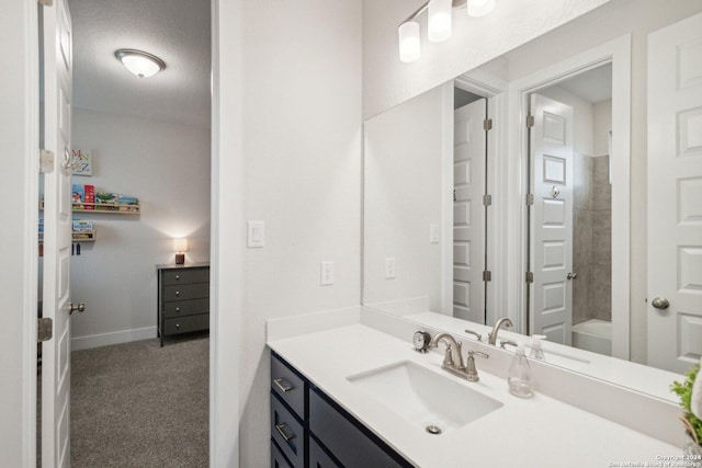 bathroom with vanity, shower / bathtub combination, and a textured ceiling