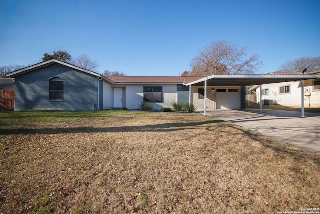 single story home with a front lawn and a carport