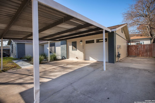 garage featuring a carport