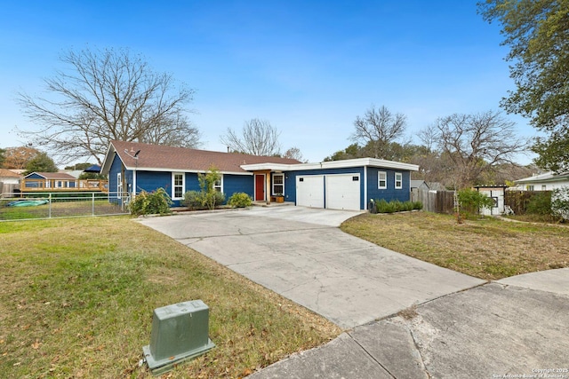 single story home with a front yard and a garage