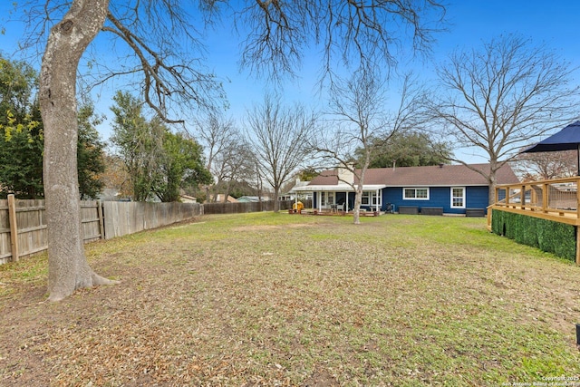 view of yard featuring a deck