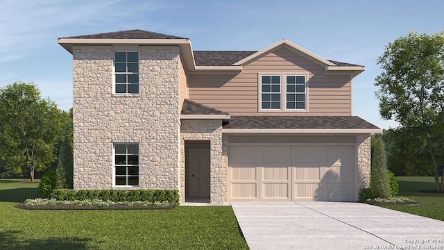 view of front of home featuring a garage and a front lawn