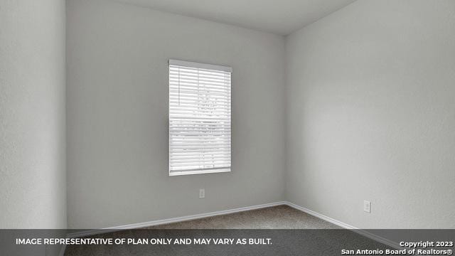 spare room with carpet flooring