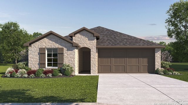 view of front of home featuring a garage and a front lawn