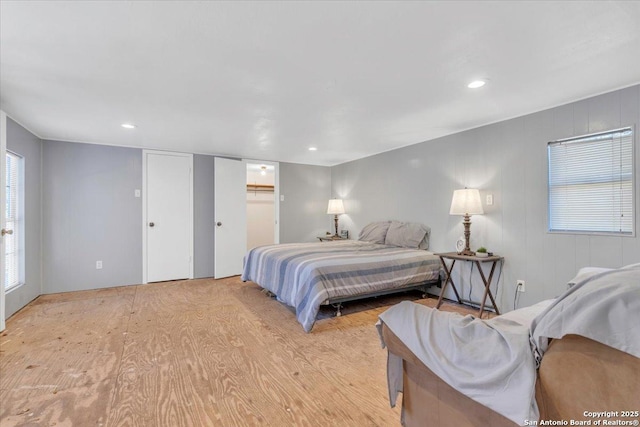 bedroom with light hardwood / wood-style flooring