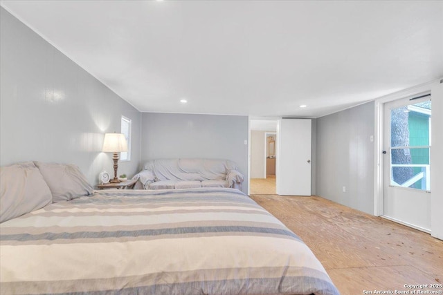 bedroom with light hardwood / wood-style floors