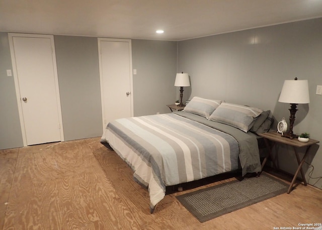 bedroom with light wood-type flooring