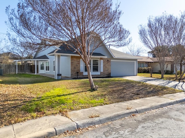 ranch-style home with a front lawn, cooling unit, and a garage