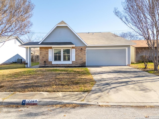 ranch-style home featuring a front yard, central air condition unit, and a garage