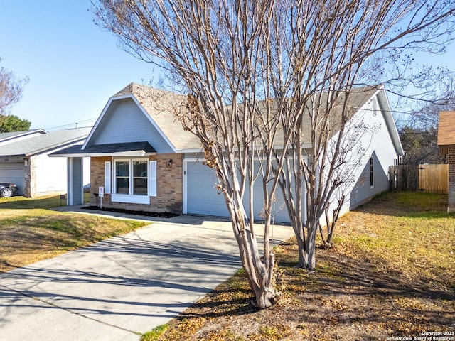 view of front facade with a front lawn and a garage