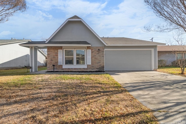 single story home featuring a garage and a front yard