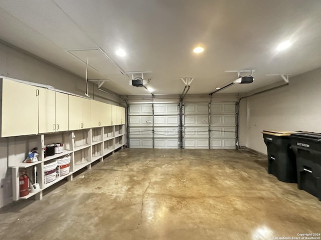 garage featuring a garage door opener