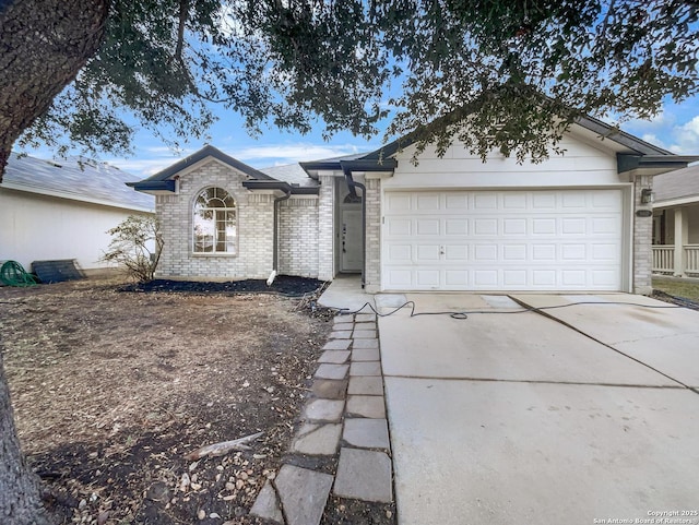 ranch-style home with a garage