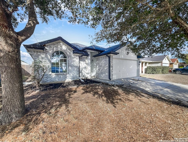 view of front of home with a garage