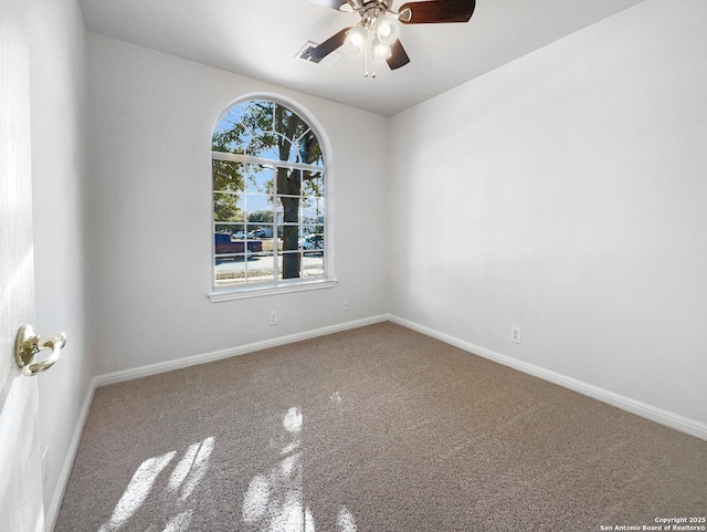 spare room featuring ceiling fan