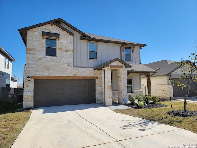 view of front of property featuring a garage