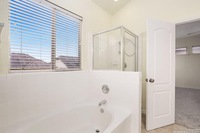 bathroom with independent shower and bath