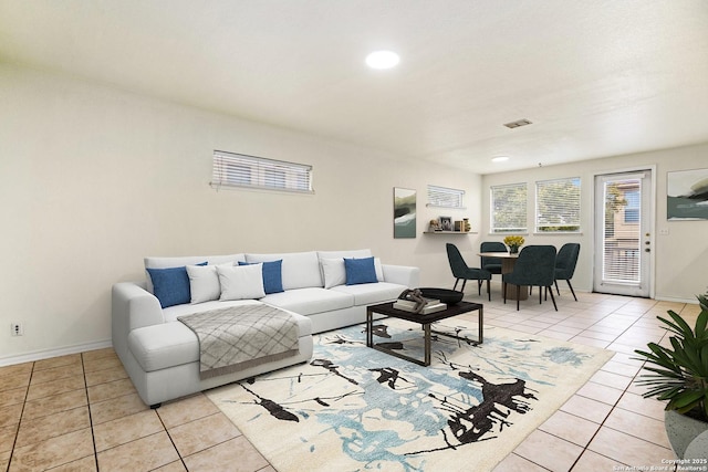 living room featuring light tile patterned floors