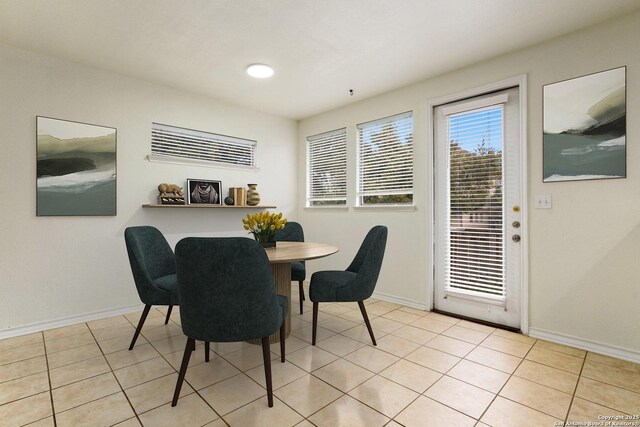 view of tiled dining space