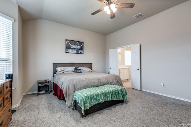 bedroom with ceiling fan, vaulted ceiling, carpet, and multiple windows