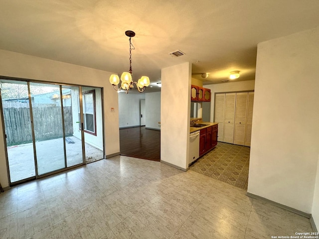 interior space with sink and an inviting chandelier