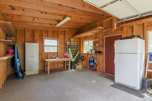 garage with white fridge