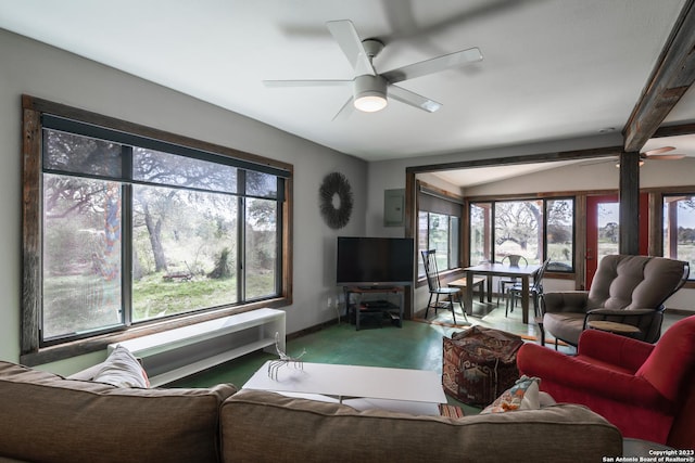 living room featuring ceiling fan and a wealth of natural light