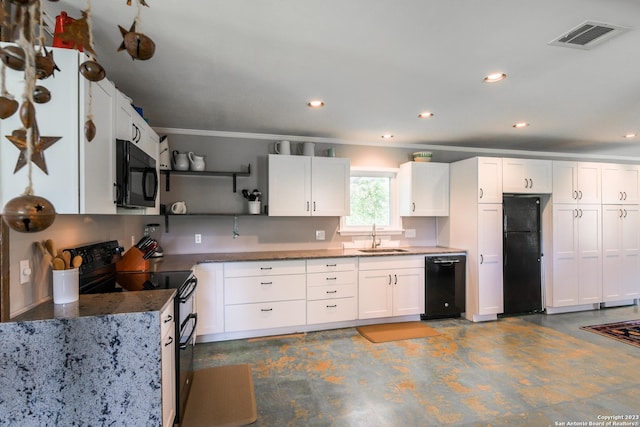 kitchen with sink, white cabinetry, black appliances, and ornamental molding