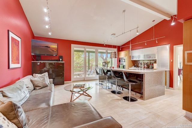 living room featuring high vaulted ceiling and beamed ceiling