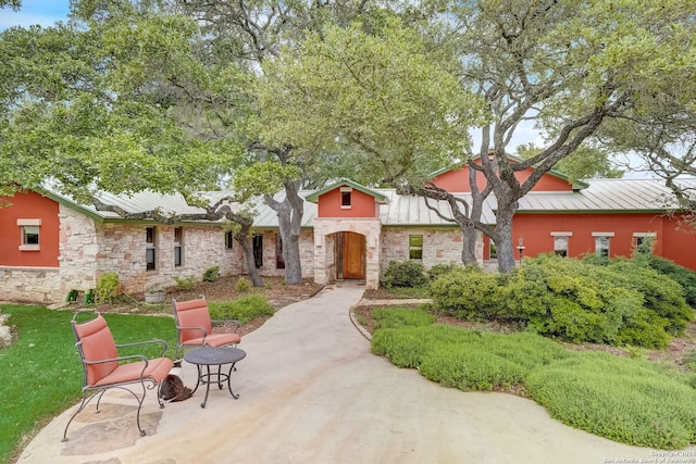 view of front of house featuring a patio