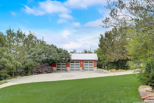 view of yard featuring a garage