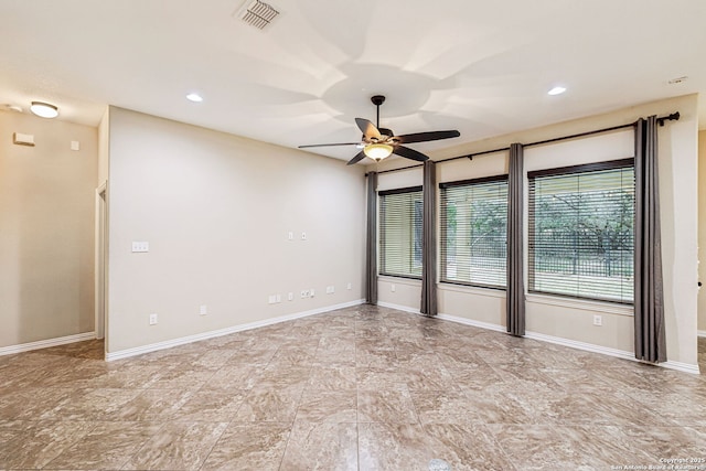 empty room featuring ceiling fan