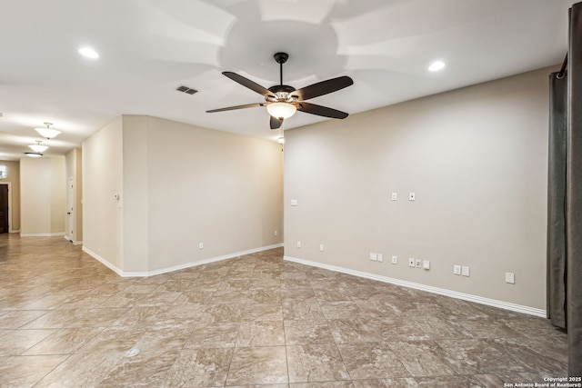 spare room featuring ceiling fan