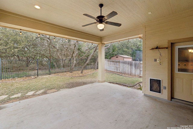 view of patio featuring ceiling fan