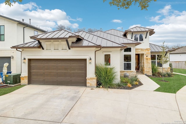 view of front of house with central AC and a garage