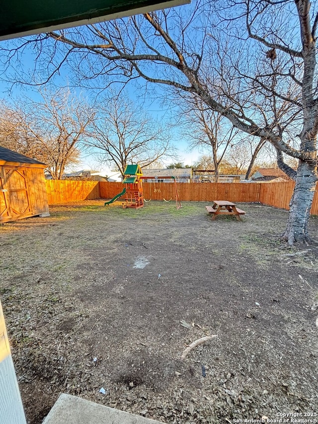 view of yard with a playground