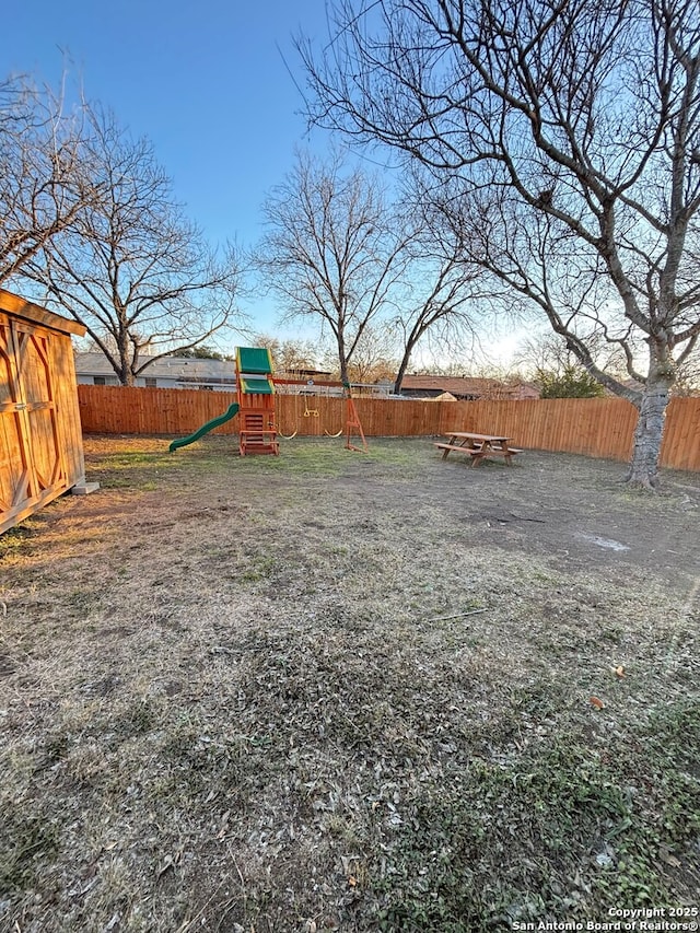 view of yard featuring a playground