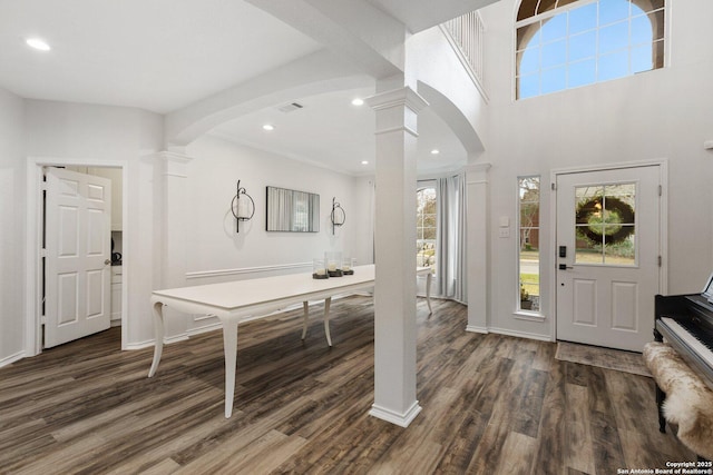 foyer featuring recessed lighting, ornate columns, visible vents, wood finished floors, and baseboards