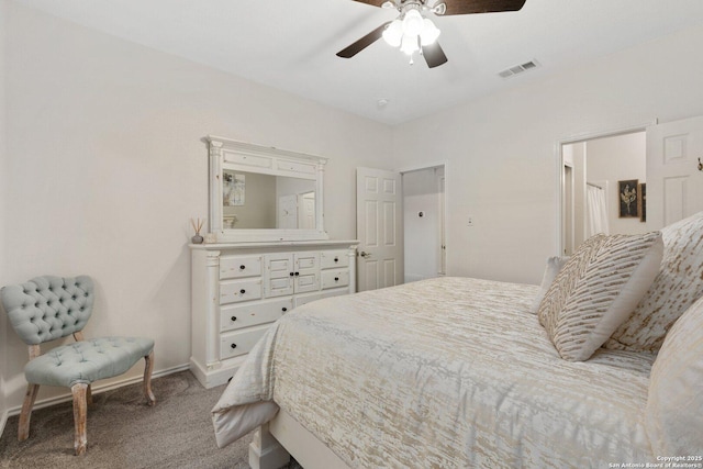 bedroom featuring baseboards, visible vents, ceiling fan, and carpet flooring