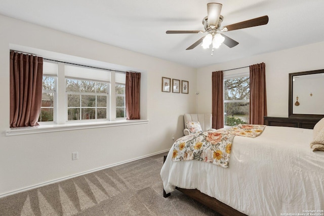 bedroom featuring carpet floors, ceiling fan, and baseboards